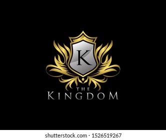 Royal Shield K Letter Logo. Golden Vintage Shield With K Letter and crown prefect for boutique, hotel, restaurant, wedding and other vintage business. 