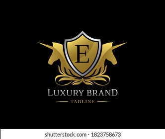 Logo Real De Unicornio Con Letra E. Elegante diseño de insignia Gold Shield para la realeza, letra estampado, Boutique, Hotel, Heraldic, Joyería, Boda.