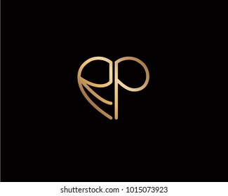 RP initial heart shape gold colored logo