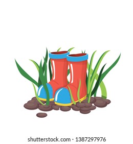 rubber boots in the garden in the grass