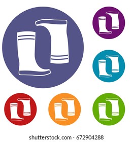 Rubber boots icons set in flat circle reb, blue and green color for web
