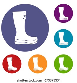 Rubber boots icons set in flat circle reb, blue and green color for web