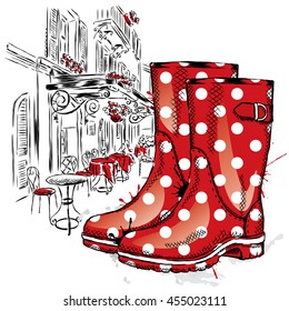 Rubber boots on a background of a city street. Vector illustration for greeting card, poster, or print on clothes. Fashion & Style. Vintage drawing.