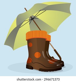 Rubber boots and umbrella