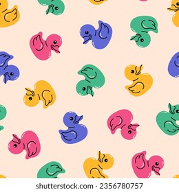 Rubber duck in different colours seamless pattern. Hand drawn trendy flat vector illustration. 