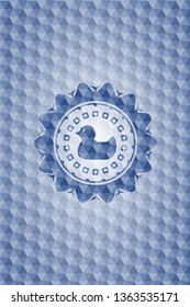 rubber duck icon inside blue emblem or badge with abstract geometric pattern background.