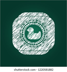 rubber duck icon inside chalkboard emblem