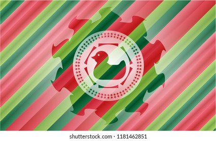 rubber duck icon inside christmas badge background.