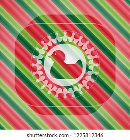 rubber duck icon inside christmas badge.