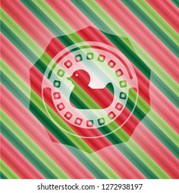 rubber duck icon inside christmas style badge..