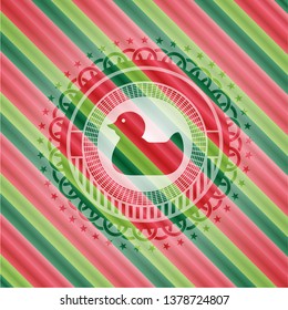 rubber duck icon inside christmas style badge..