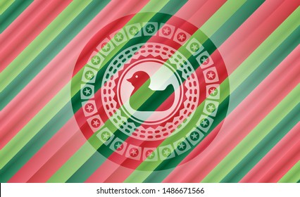 rubber duck icon inside christmas colors style badge.