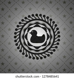 rubber duck icon inside dark badge or emblem