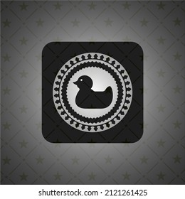 rubber duck icon inside dark emblem. Retro. 