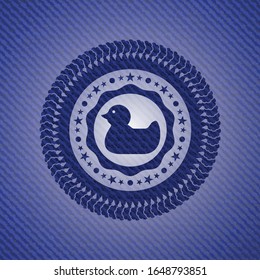 rubber duck icon inside denim background