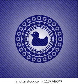 rubber duck icon inside emblem with jean texture
