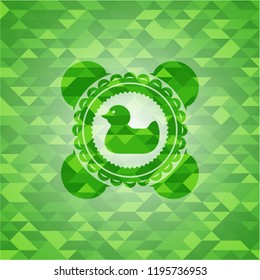 rubber duck icon inside green mosaic emblem