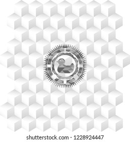 rubber duck icon inside grey emblem with geometric cube white background