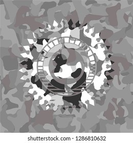 rubber duck icon inside grey camouflage texture
