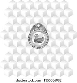 rubber duck icon inside grey badge with geometric cube white background