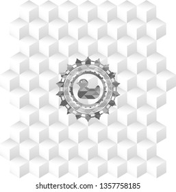 rubber duck icon inside grey emblem with cube white background