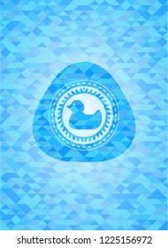 rubber duck icon inside light blue emblem with triangle mosaic background