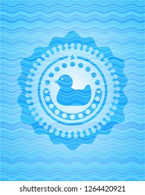 rubber duck icon inside light blue water wave style badge.