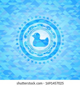 rubber duck icon inside light blue emblem. Mosaic background