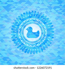 rubber duck icon inside realistic light blue mosaic emblem