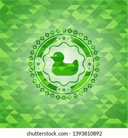 rubber duck icon inside realistic green mosaic emblem