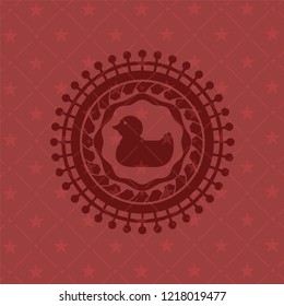 rubber duck icon inside red emblem. Retro