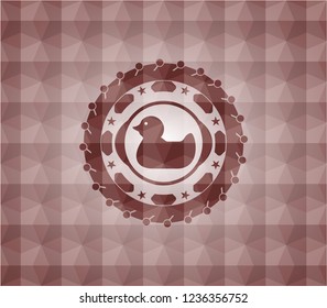 rubber duck icon inside red seamless badge with geometric pattern.