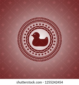 rubber duck icon inside red emblem. Retro