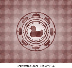 rubber duck icon inside red seamless emblem or badge with geometric pattern background.