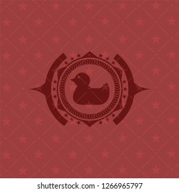 rubber duck icon inside red emblem. Vintage.