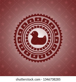 rubber duck icon inside red emblem. Retro