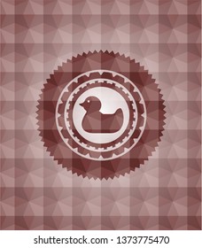 rubber duck icon inside red seamless emblem with geometric background.