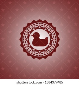 rubber duck icon inside red emblem. Retro