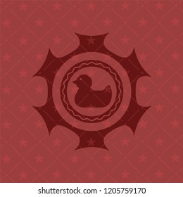 rubber duck icon inside retro red emblem