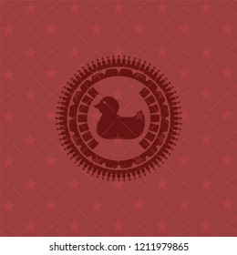 rubber duck icon inside retro style red emblem