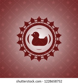 rubber duck icon inside retro style red emblem
