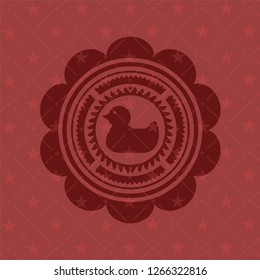 rubber duck icon inside retro red emblem