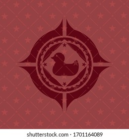 rubber duck icon inside retro style red emblem