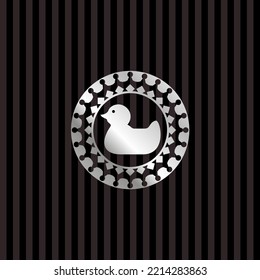 rubber duck icon inside silver emblem. 