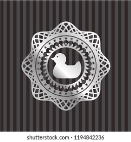 rubber duck icon inside silvery badge or emblem