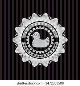 rubber duck icon inside silvery emblem or badge