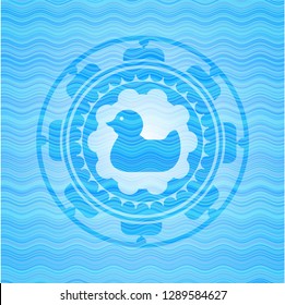 rubber duck icon inside sky blue water style badge.