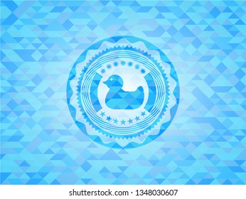 rubber duck icon inside sky blue emblem with mosaic background