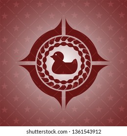 rubber duck icon inside vintage red emblem