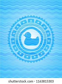 rubber duck icon inside water wave representation emblem background.
